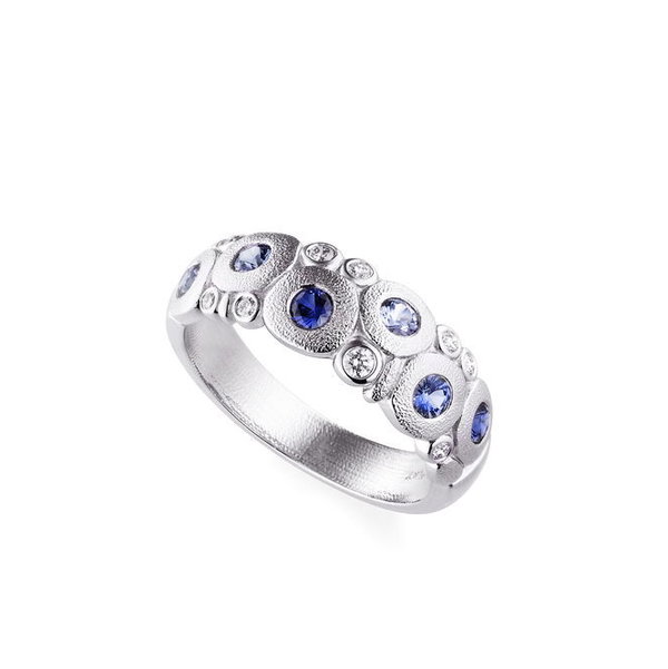 Closeup photo of Candy Ring with Bright Blue Sapphires in Platinum