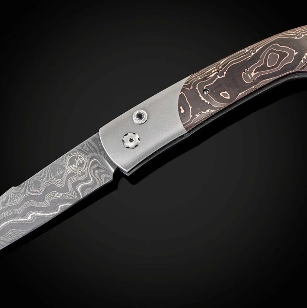 Closeup photo of B22 Black Max Automatic Opening Folding Knife with Titanium, Damascus, and Carbon Fiber