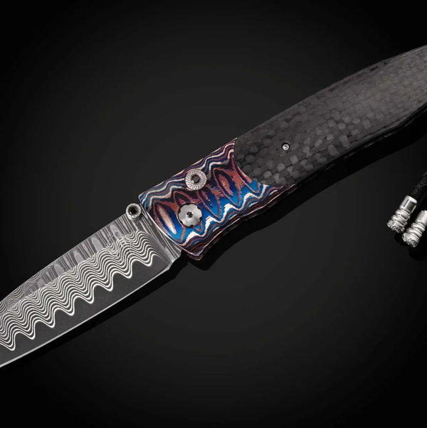 Closeup photo of B30 Azure Sky Pocketknife with Wave Mokume Gane and Carbon Fiber- 044/250