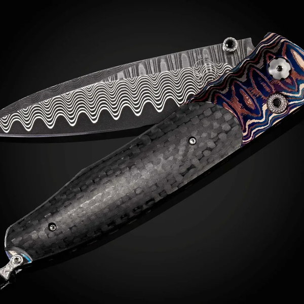 Closeup photo of B30 Azure Sky Pocketknife with Wave Mokume Gane and Carbon Fiber- 044/250