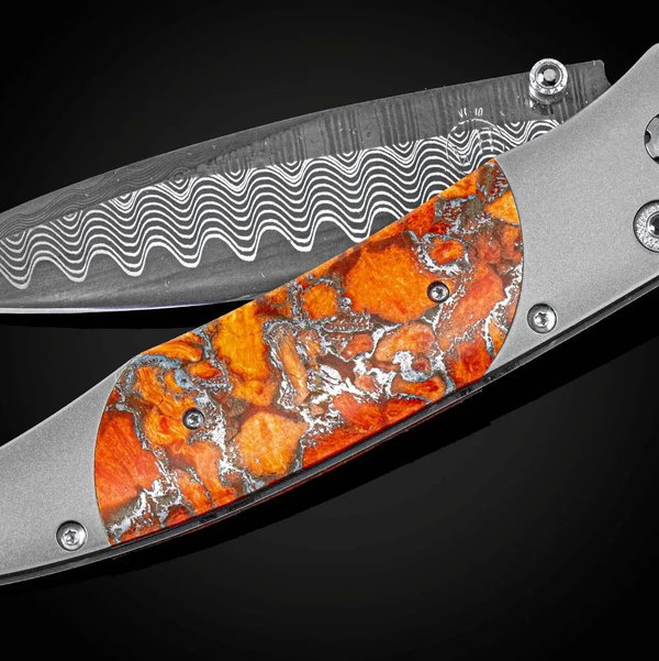Closeup photo of B30 Dark Waves Titanium Pocketknife with Apple Coral, and 'Wave' Damascus Blade - 20/50