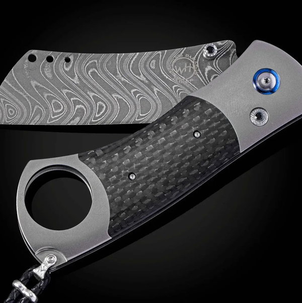 Closeup photo of CG1 Techno II Titanium Cigar Cutter with Carbon Fiber and Damascus Blade - 006/500