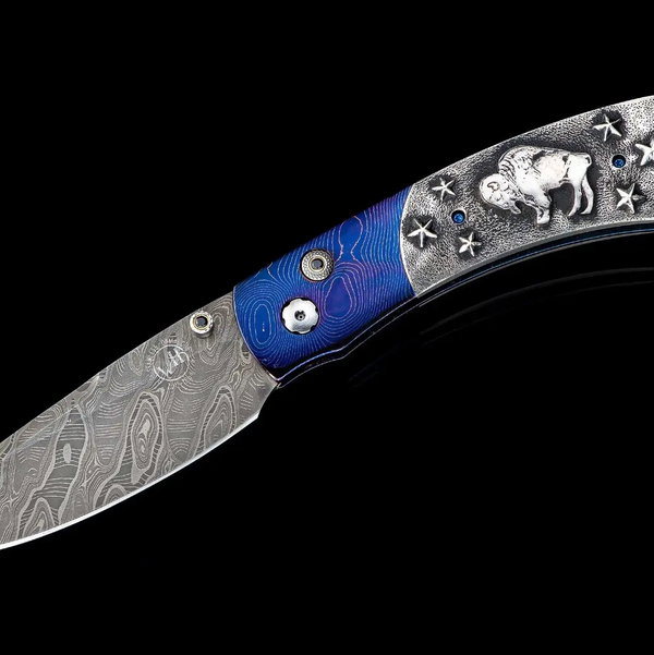 Closeup photo of B12 Buffalo Nickel III Damascus Pocketknife Inlaid with Sterling Silver and Authentic Buffalo Nickels