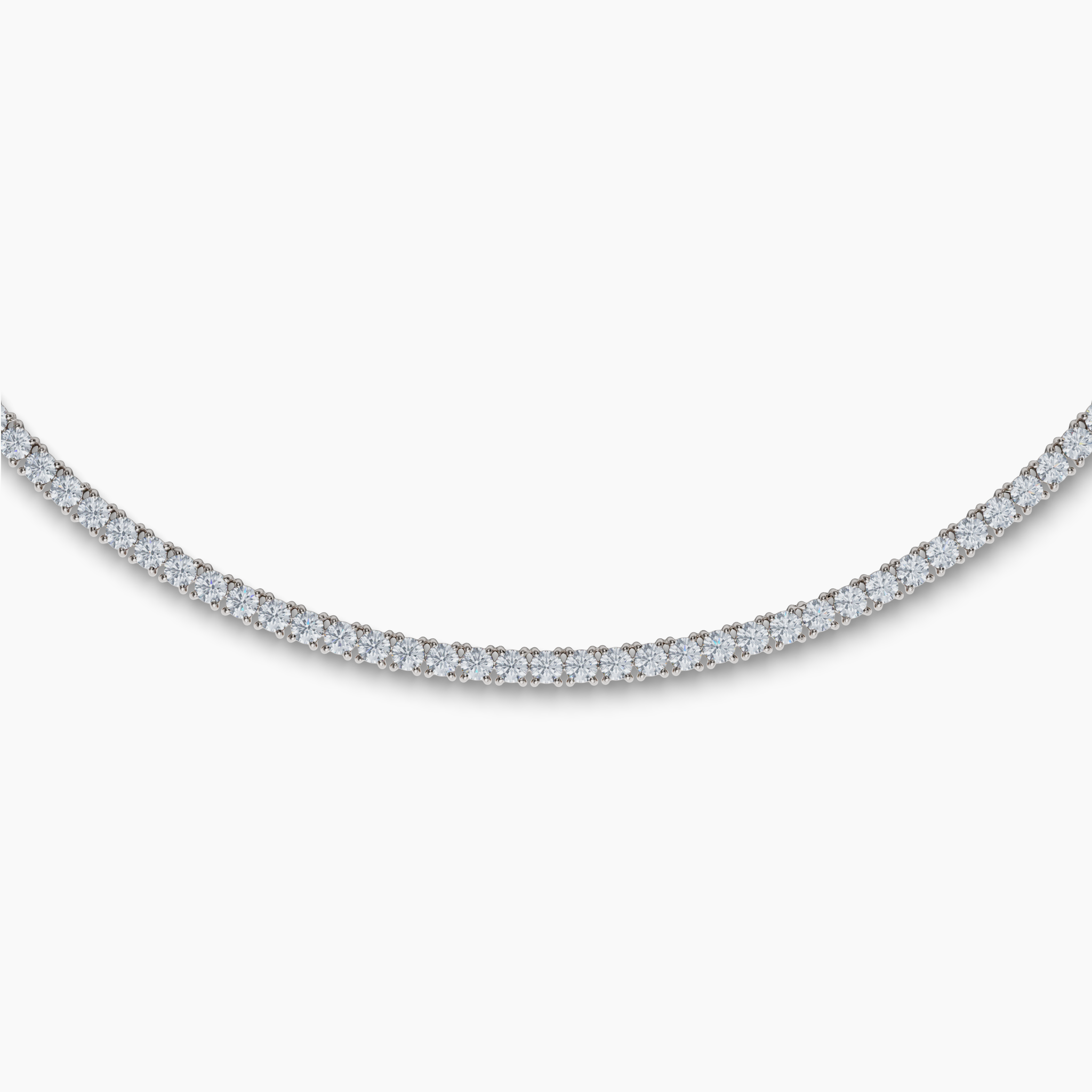 Material: 14K White GoldDiamonds: 15CTW Round Carbon Neutral Lab-Grown Diamonds, F+ VS+Details: 4 Prong Set, 16", with Signature Purple Lab Diamond on ClaspClosure: Box ClaspSustainability: Lab-Grown with Wind and Solar Energy Diamond Classics Lab Grown Round 4 Prong Tennis Necklace (15CT), White Gold