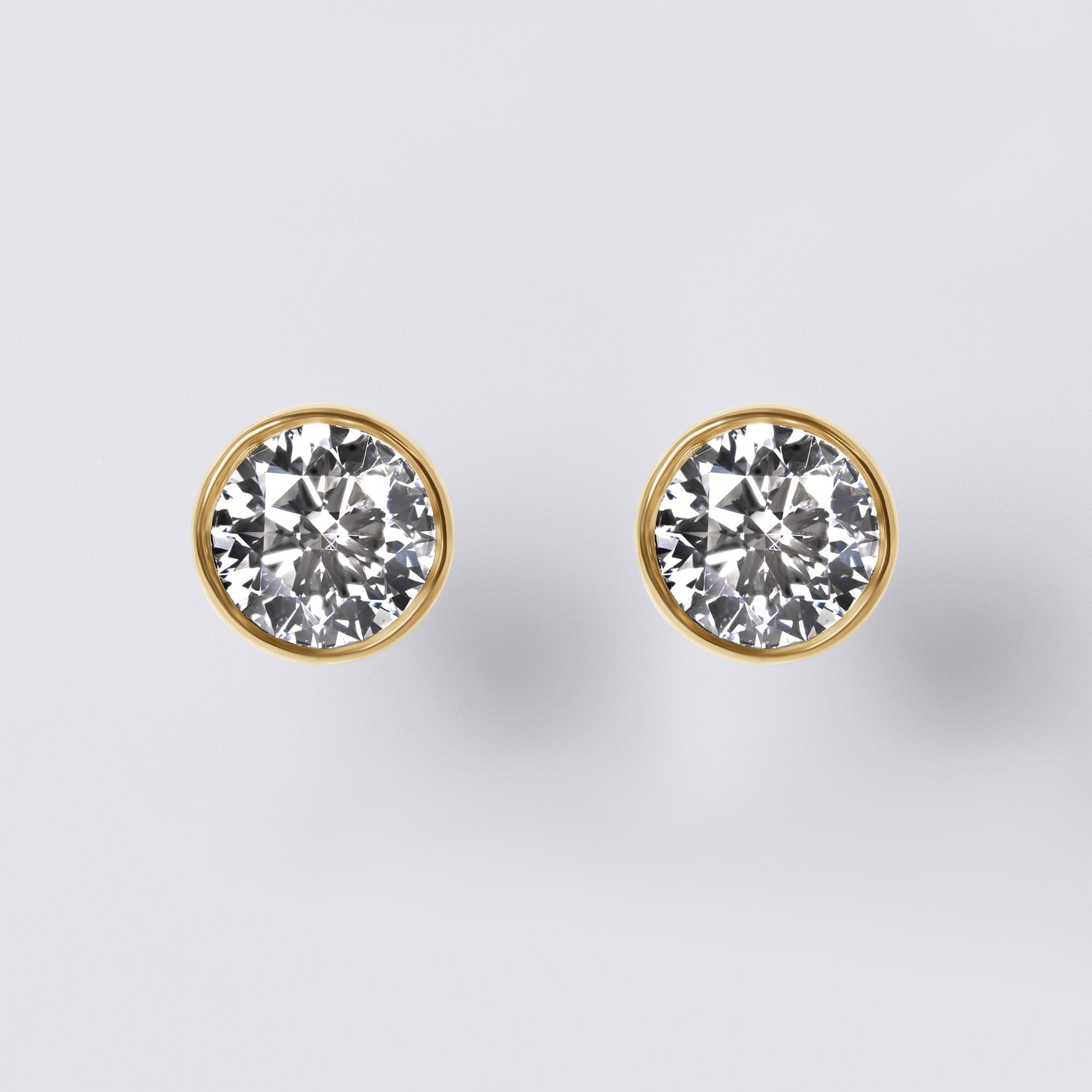 Material: 14K Yellow GoldDiamonds: 2CTW Round Carbon Neutral Lab-Grown Diamonds, F+ VS+Details: Signature Purple Lab Diamond on BackClosure: Friction BacksSustainability: Lab-Grown with Wind and Solar Energy Diamond Essentials Lab Grown Round Bezel Studs (2CT), Yellow Gold