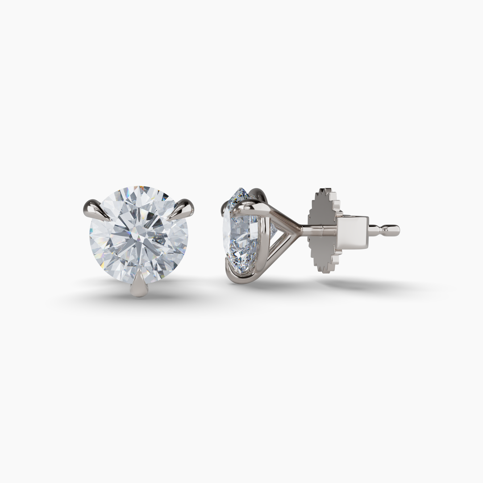 These elegant martini stud earrings feature 5 total carats of lab-grown round brilliant diamonds, celebrated for their exceptional brilliance and fire. Created using wind and solar energy, the diamonds are 100% carbon-neutral, reflecting a commitment to sustainability. These sleek three-prong martini set studs are crafted in recycled 14K white gold. These diamonds include a report from the GIA.The image(s) shown are four (4) carat studs and are for product style purposes only. Diamond Essentials Lab Grown Round Studs (5CT), White Gold