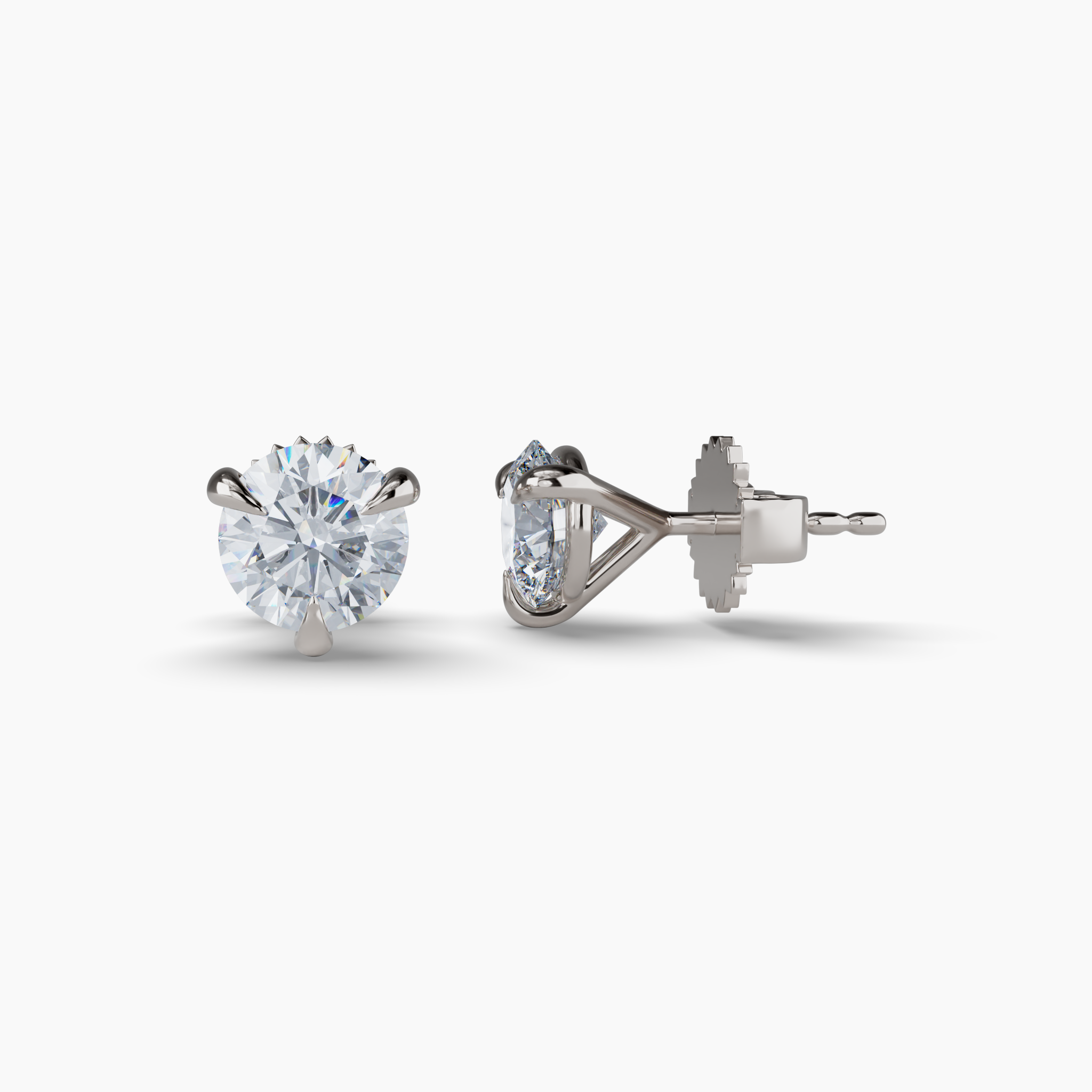 Material: 14K Recycled White GoldDiamonds: 3CTW Round Carbon Neutral Lab-Grown Diamonds, F+ VS+Details: Martini Three ProngClosure: Friction BacksSustainability: Recycled Gold and Lab-Grown with Wind and Solar Energy Diamond Classics Lab Grown Round Studs (3CT), White Gold