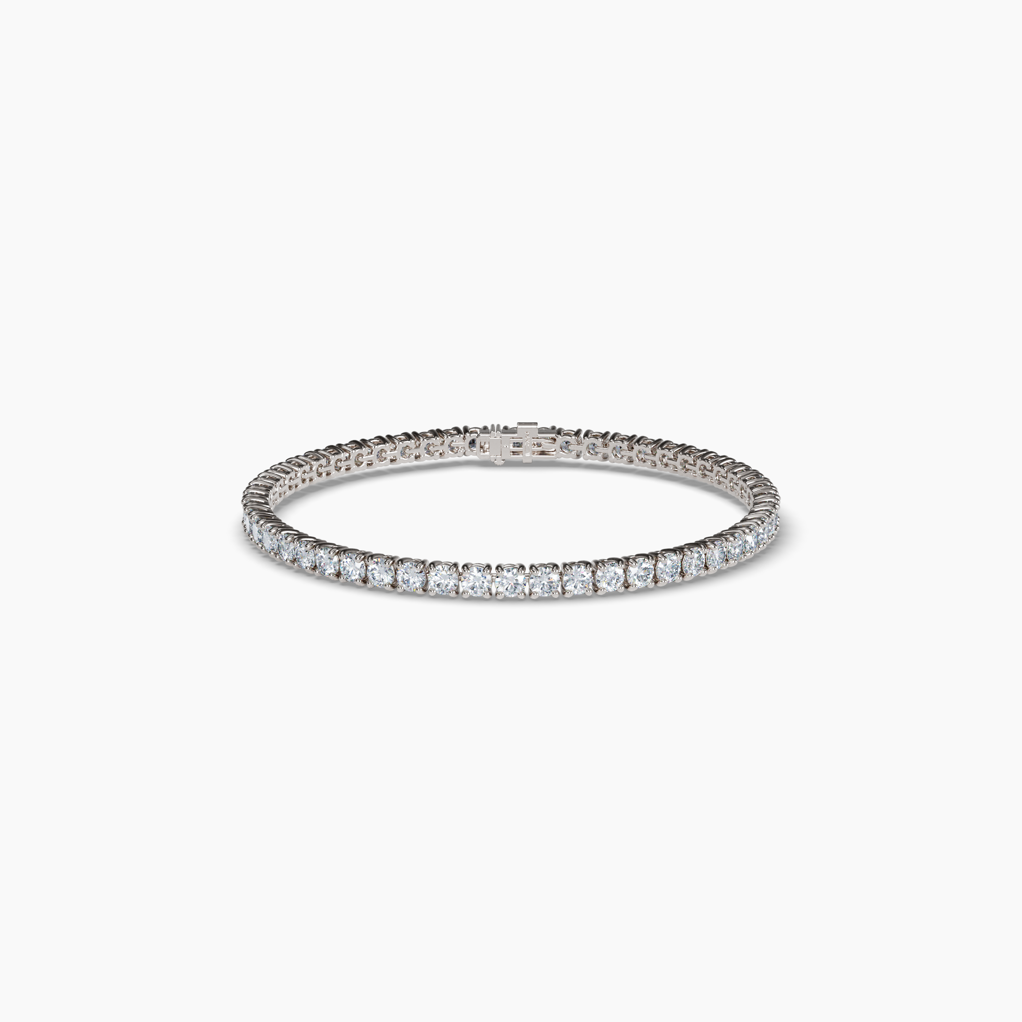 This stunning 7-inch tennis bracelet showcases 4 total carats of round lab-grown diamonds, each set in a classic four-prong design. Sustainably created using wind and solar energy, these diamonds are 100% carbon-neutral, delivering exceptional brilliance with a commitment to the environment. Crafted in 14K recycled white gold, this bracelet blends timeless elegance with eco-conscious craftsmanship. Perfect for both everyday wear and special occasions, it adds a touch of sophistication to any look. Diamond Essentials Lab Grown Round 4 Prong Tennis Bracelet (4CT), White Gold, 7-inch