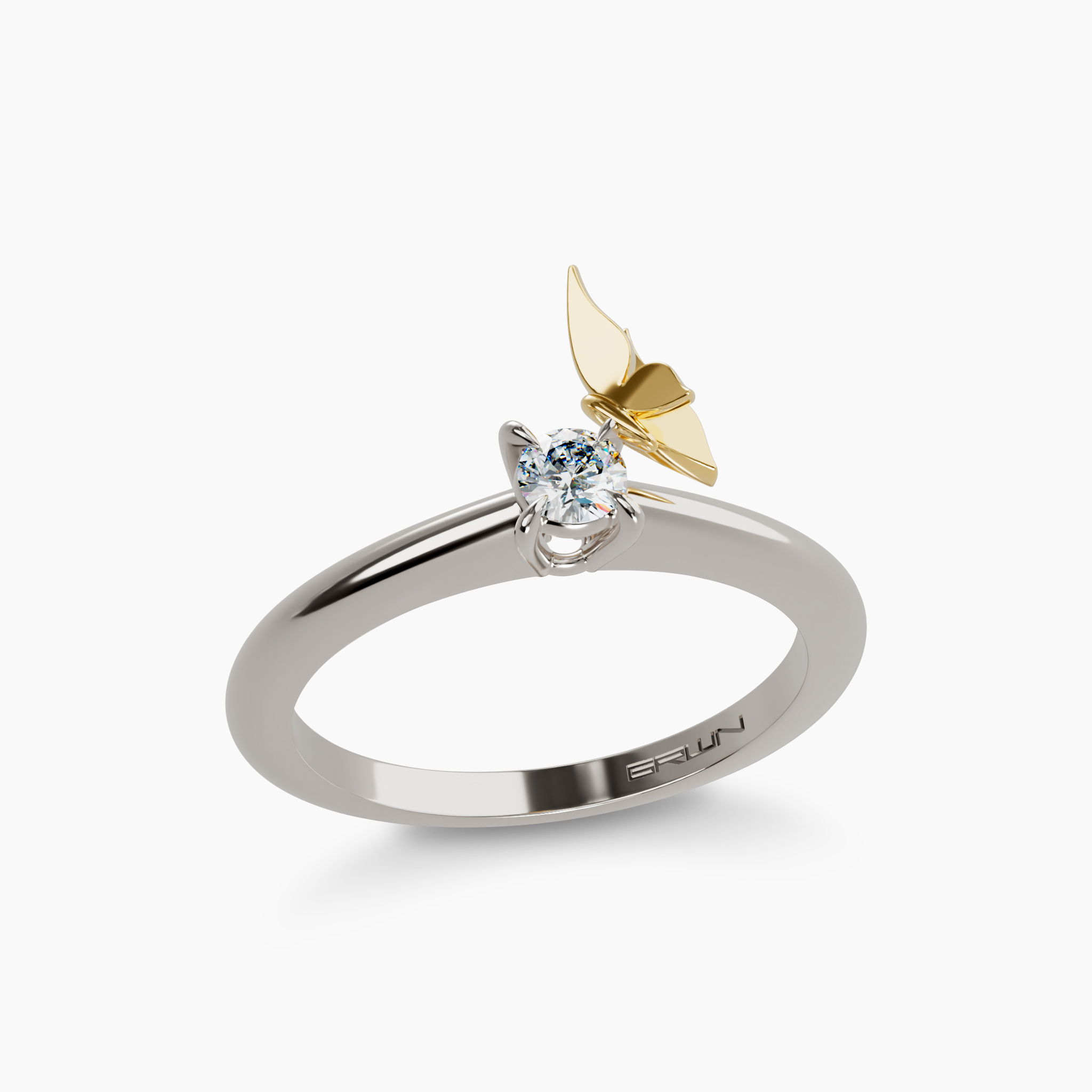 Embrace the exquisite craftsmanship of the "Metamorphosis" ring, elegantly designed with 18K gold and sterling silver and highlighted by a .20 carat diamond in a captivating butterfly motif. This stunning ring combines luxury with whimsy, perfect for adding a touch of enchantment to any occasion. Metamorphosis Diamond Butterfly Ring