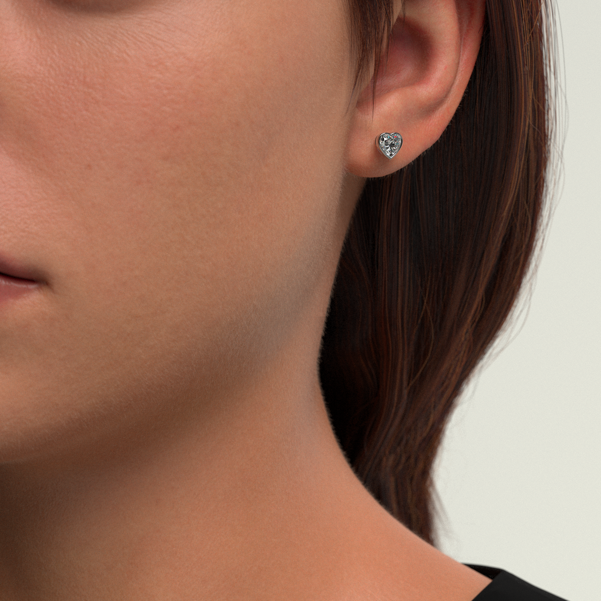 Material: 925 Sterling Silver, White RhodiumStones: 1.2ctw Heart-Shaped Carbon Neutral Lab-Grown Diamonds, F+ VS+Details: Signature Purple Lab Diamond on BackClosure: Secure Push BackSustainability: Lab-Grown with Wind and Solar Energy Bezel Set Heart Lab Diamond Stud Earrings, Sterling Silver
