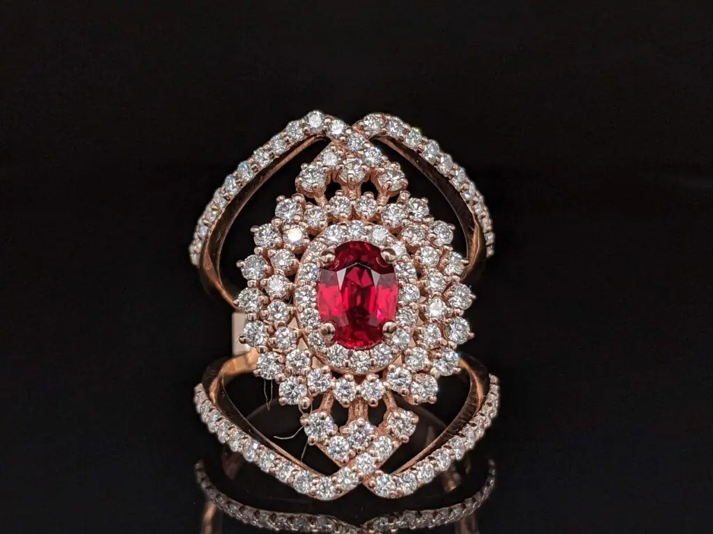 Custom gold ring with a central gemstone