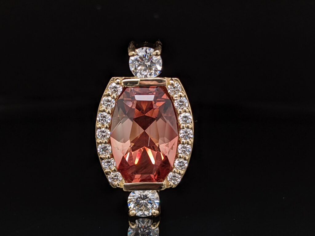 Cushion garnet halo ring