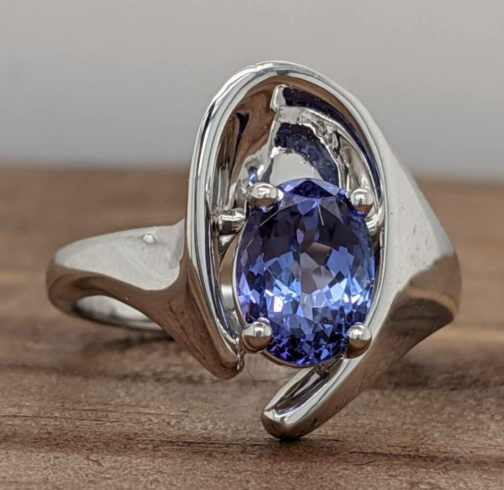 Tanzanite bypass ring in white gold
