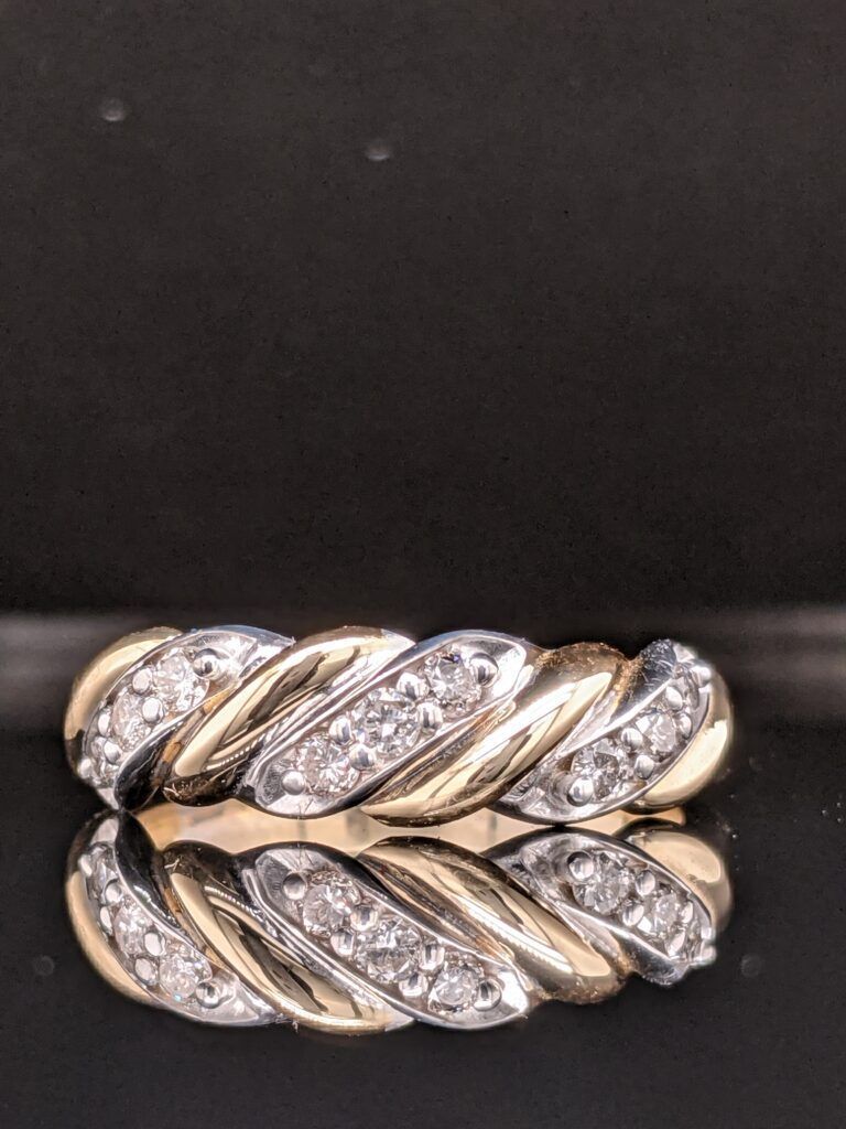 Rose gold channel-set diamond band