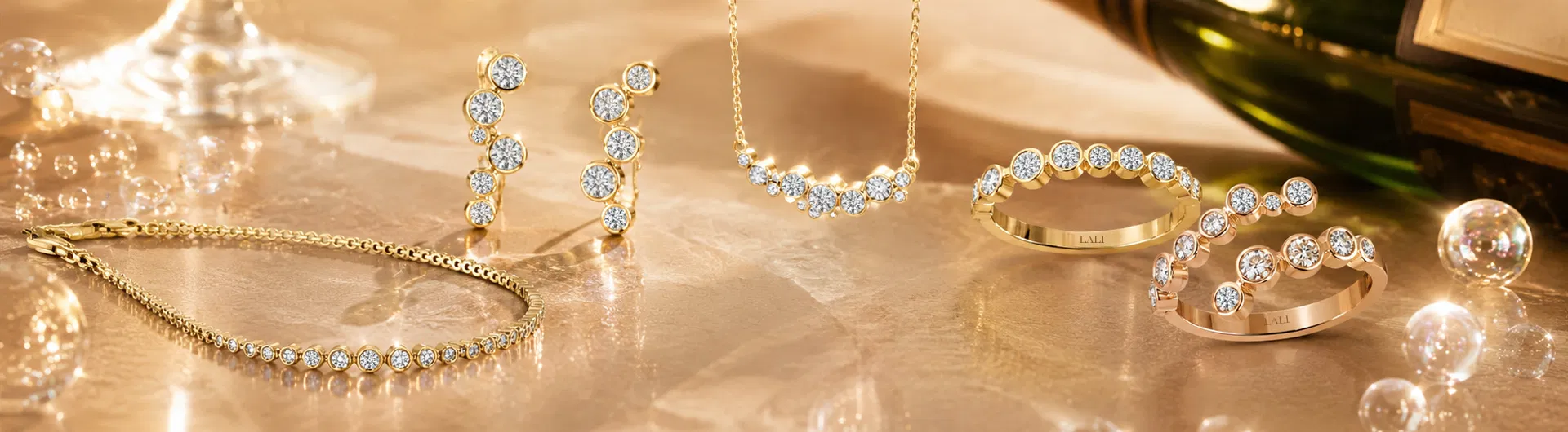 Champagne-gold diamond jewelry from the Epernay Collection arranged on velvet