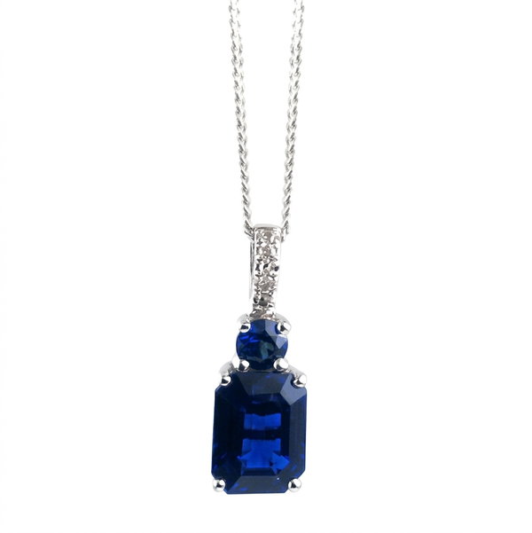 Closeup photo of 14K WHITE GOLD DIAMOND AND SAPPHIRE PENDANT WITH CHAIN