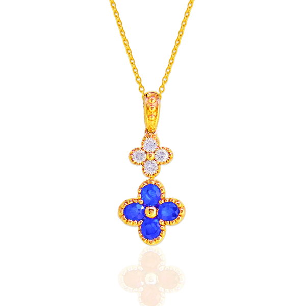 Closeup photo of 14K YELLOW GOLD DIAMOND AND SAPPHIRE CLOVER PENDANT WITH CHAIN