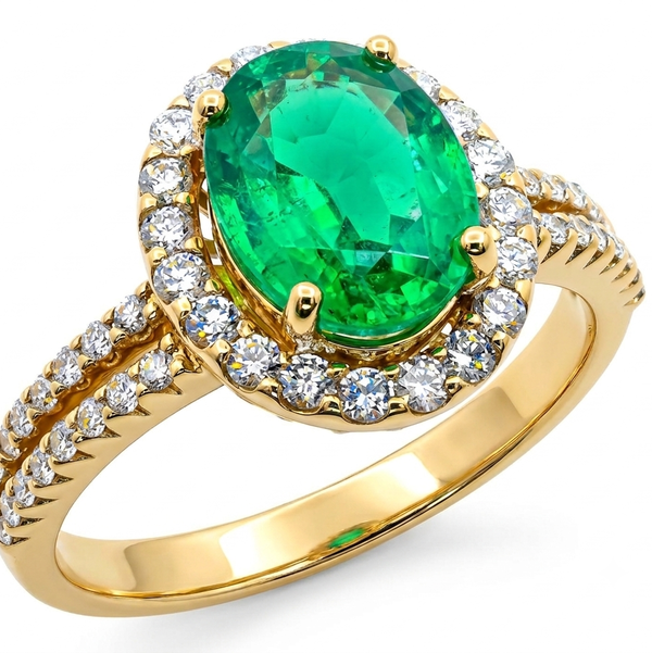 Closeup photo of 14K YELLOW GOLD DIAMOND AND EMERALD RING
