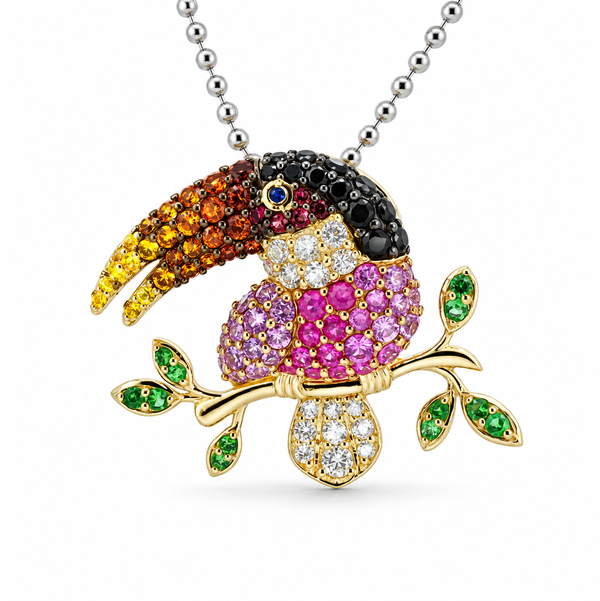 Closeup photo of 14K YELLOW GOLD TSAVORITE, BLACK SPINEL AND MULTICOLOR SAPPHIRE TOUCAN PENDANT WITH CHAIN