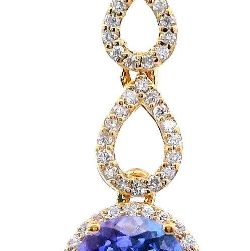 Closeup photo of 18K YELLOW GOLD DIAMOND AND TANZANITE PENDANT WITH CHAIN