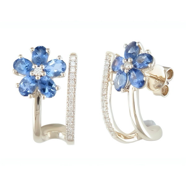 Closeup photo of 14K YELLOW GOLD DIAMOND AND TANZANITE FLOWER EARRING