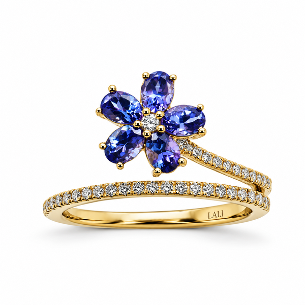Closeup photo of 14K YELLOW GOLD DIAMOND AND TANZANITE FLOWER RING