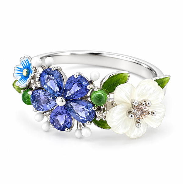 Closeup photo of 14K WHITE GOLD DIAMOND, TSAVORITE, WHITE SAPPHIRE, SAPPHIRE AND WHITE MOTHER OF PEARL FLOWER ENAMEL RING