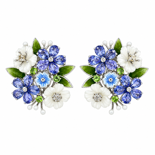 Closeup photo of 14K WHITE GOLD DIAMOND, TSAVORITE, WHITE SAPPHIRE, SAPPHIRE AND WHITE MOTHER OF PEARL FLOWER ENAMEL EARRING