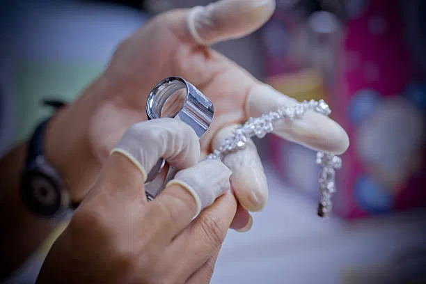 Close-up of finished fine jewelry demonstrating production quality control
