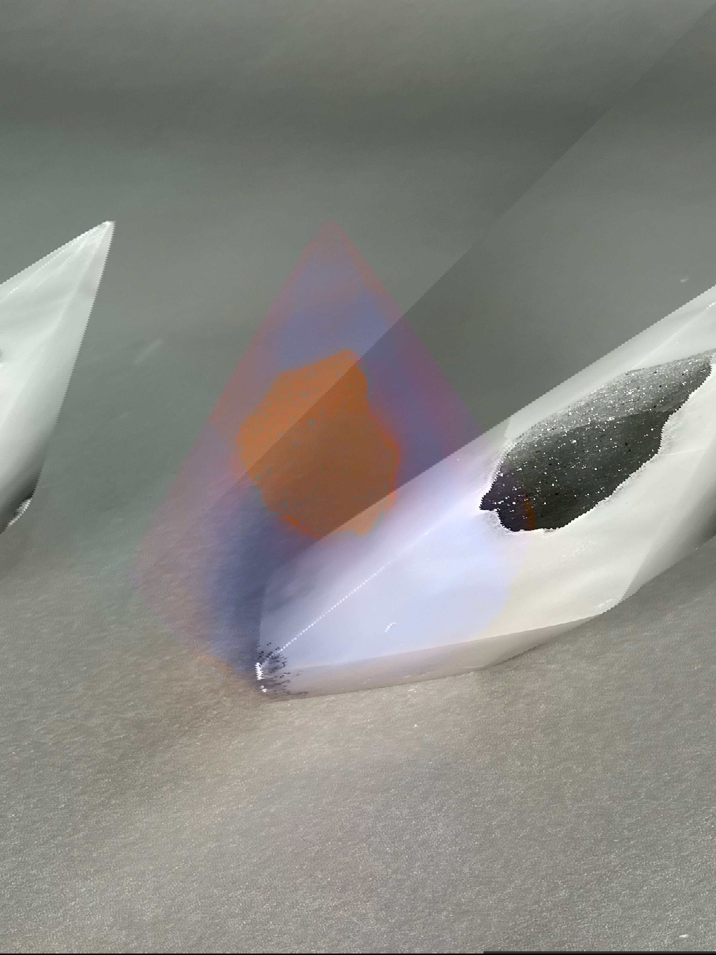 Discover the mesmerizing beauty of Agate Flame. This exclusive piece boasts a unique shape and multicolored hues that add a touch of luxury to any room. With Agate's natural properties, it is sure to bring positive energy and balance to your space. Elevate your decor with this must-have statement piece.Approx. 3" x 4" Agate Flame