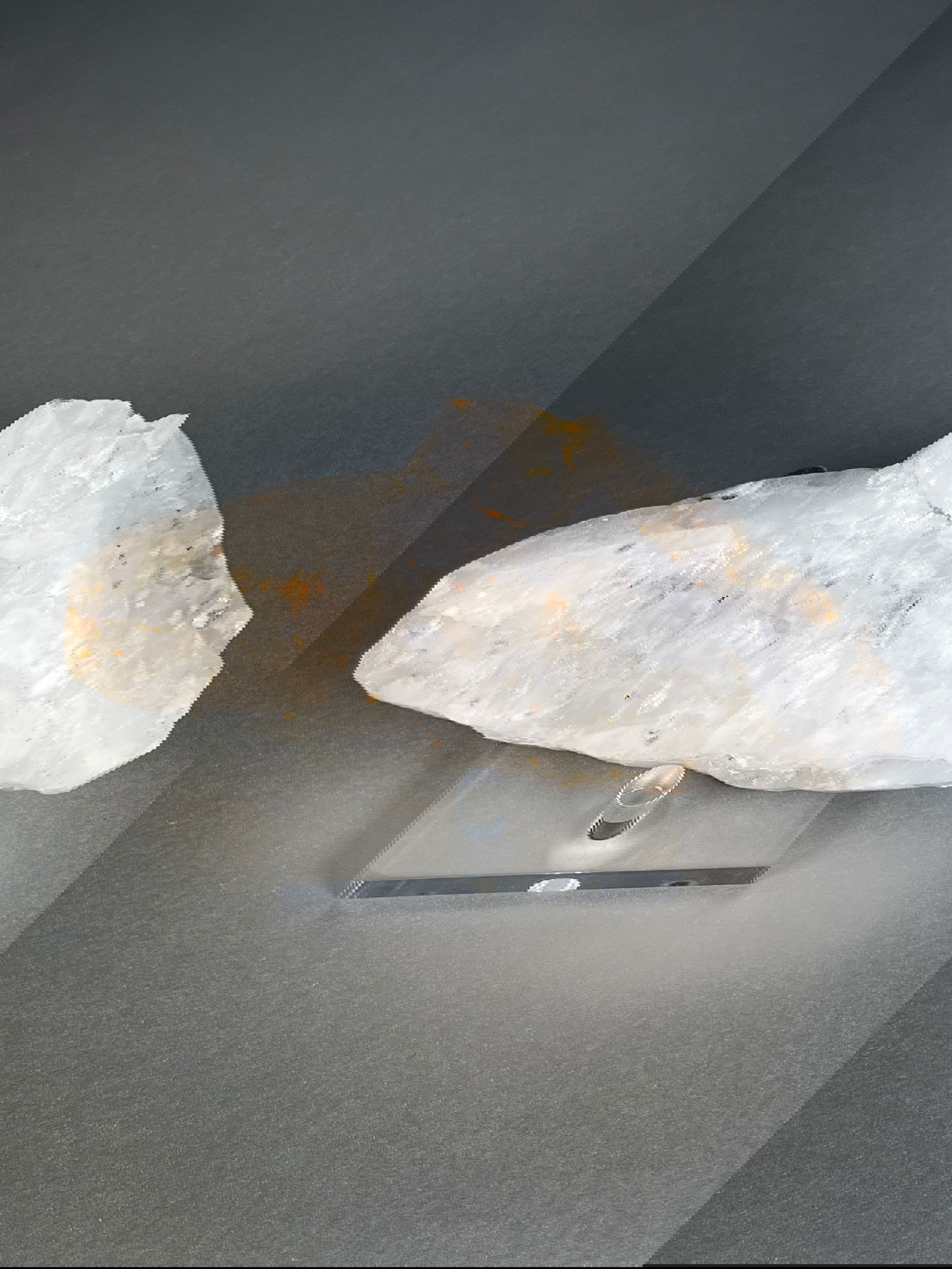 From Idaho's very own Challis Volcanics, this quartz specimen showcases how the Gem State got its name. This specimen features inclusions of Mimetite, Chlorite, and Hematite, allowing you to obtain a unique piece of Idaho's natural history.Approx. 7" x 2" Challis Idaho Quartz Specimen