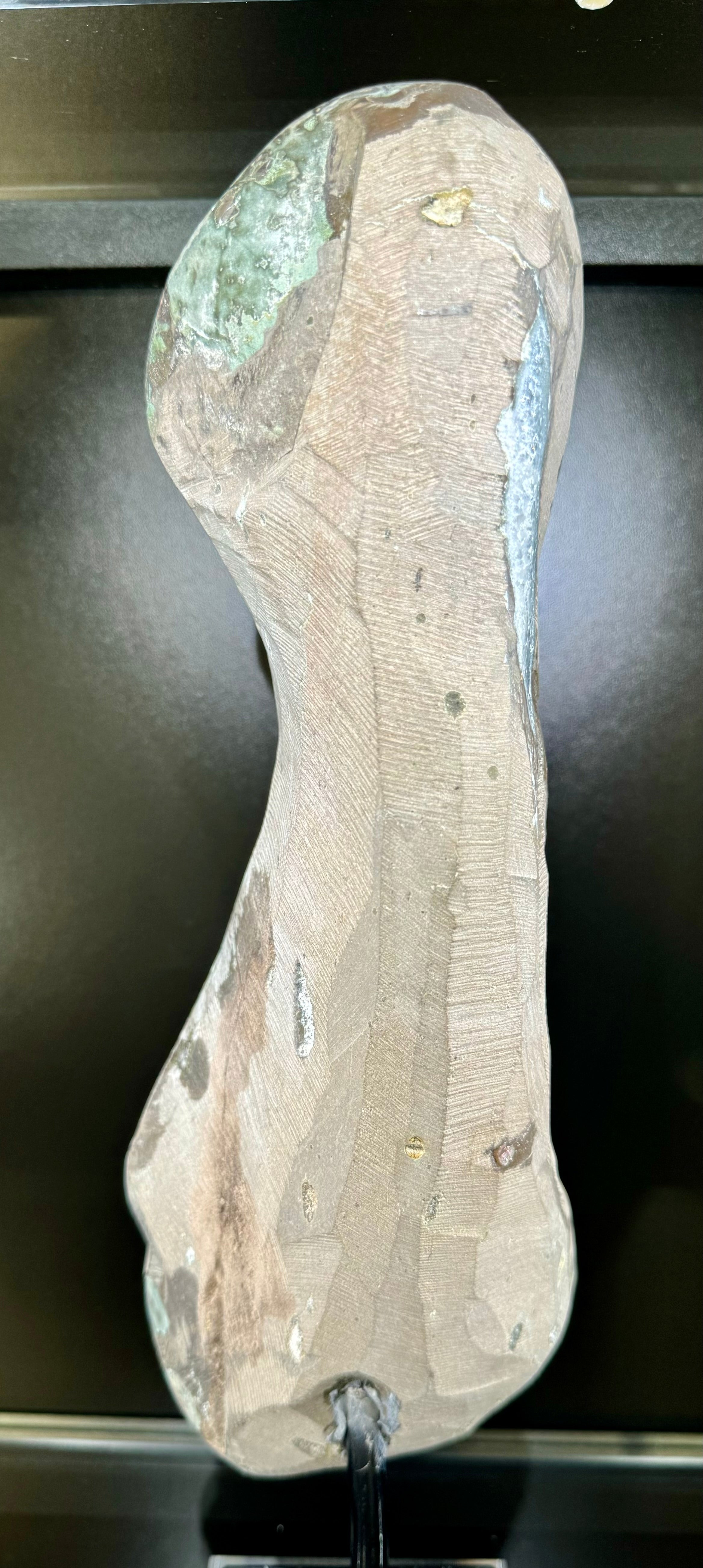 This beautiful Amethyst Geode Slab on Stand is an exquisite work of natural art. The perfect addition for any sophisticated home decor, it features a majestic crystal geode atop a display stand. Exude luxury with this one-of-a-kind piece.Approx. 12 1/2"H x 4 1/4"W x 4"D Amethyst Geode on Stand