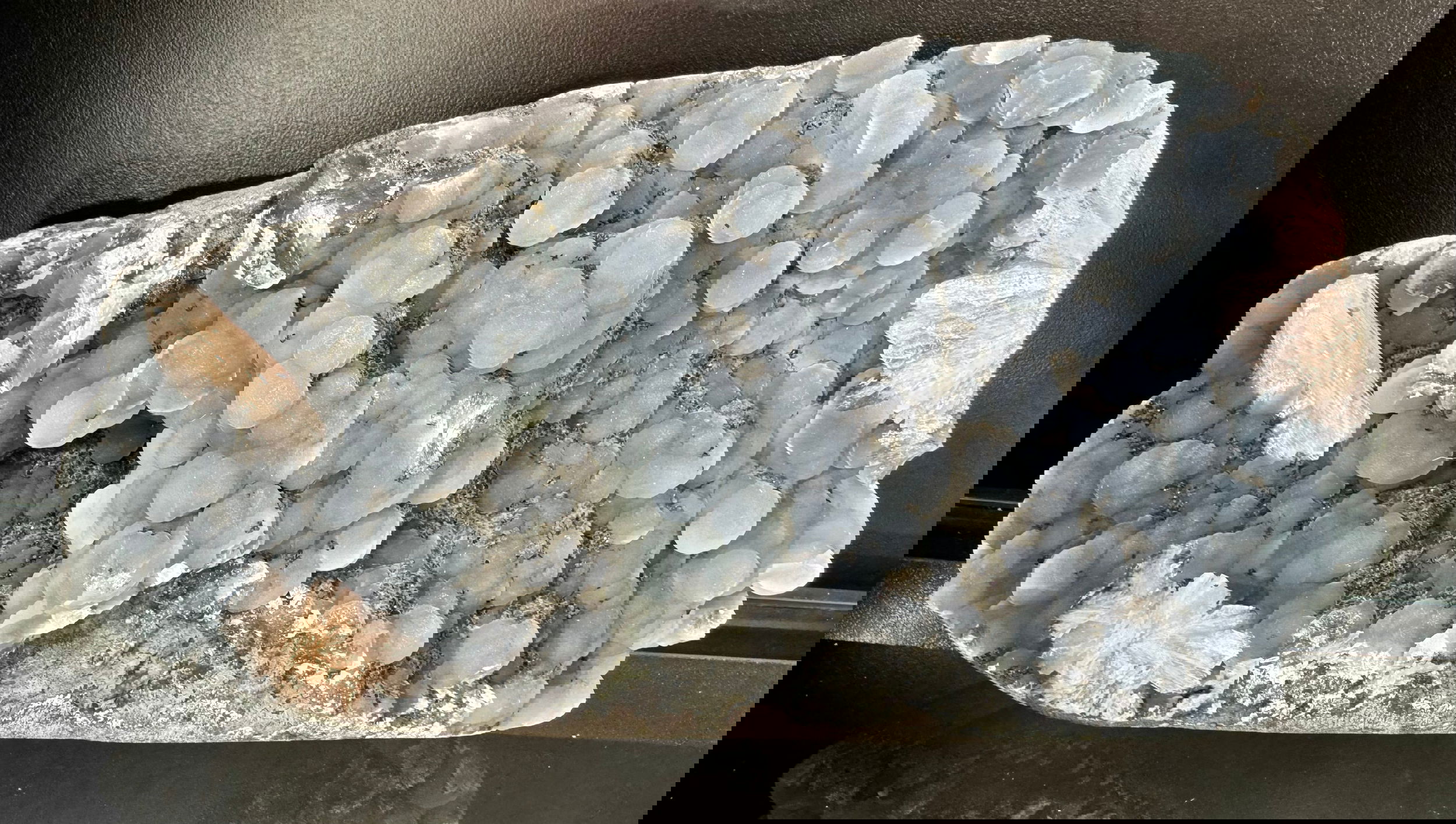 Extremely Rare specimen mineral combinationRegion- Gunjale Mine; Rahuri, Ahmadnagar District, Maharashtra, IndiaWt- 2.25kgApprox. 8.5" x 4.5" x 3" Black Chalcedony Geode with Gyrolite Balls and Stilbite Mineral Specimen