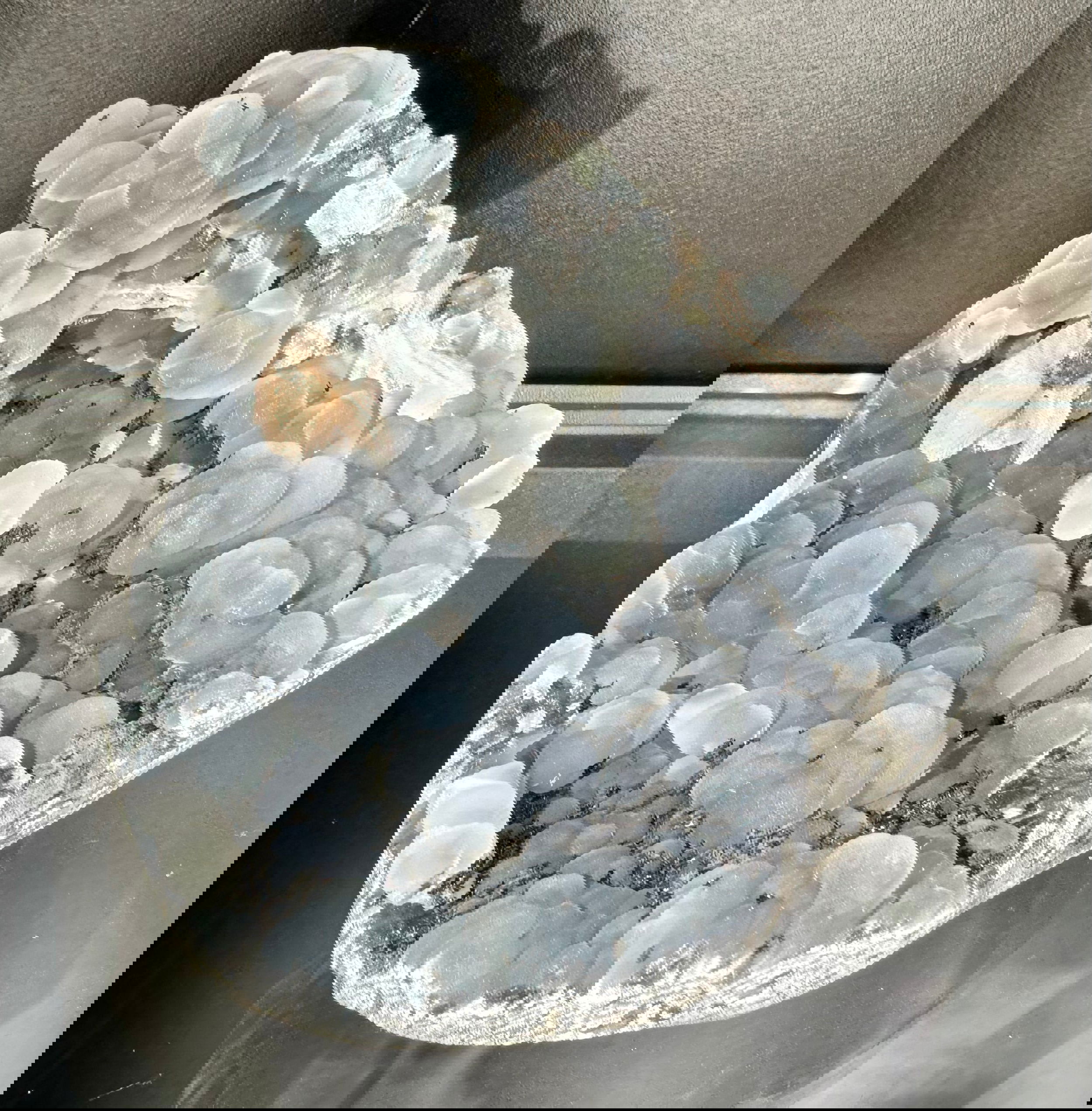 Extremely Rare specimen mineral combinationRegion- Gunjale Mine; Rahuri, Ahmadnagar District, Maharashtra, IndiaWt- .65kgApprox. 4" x 4.25" x 2.25" Black Chalcedony Geode with Gyrolite Balls and Stilbite Mineral Specimen