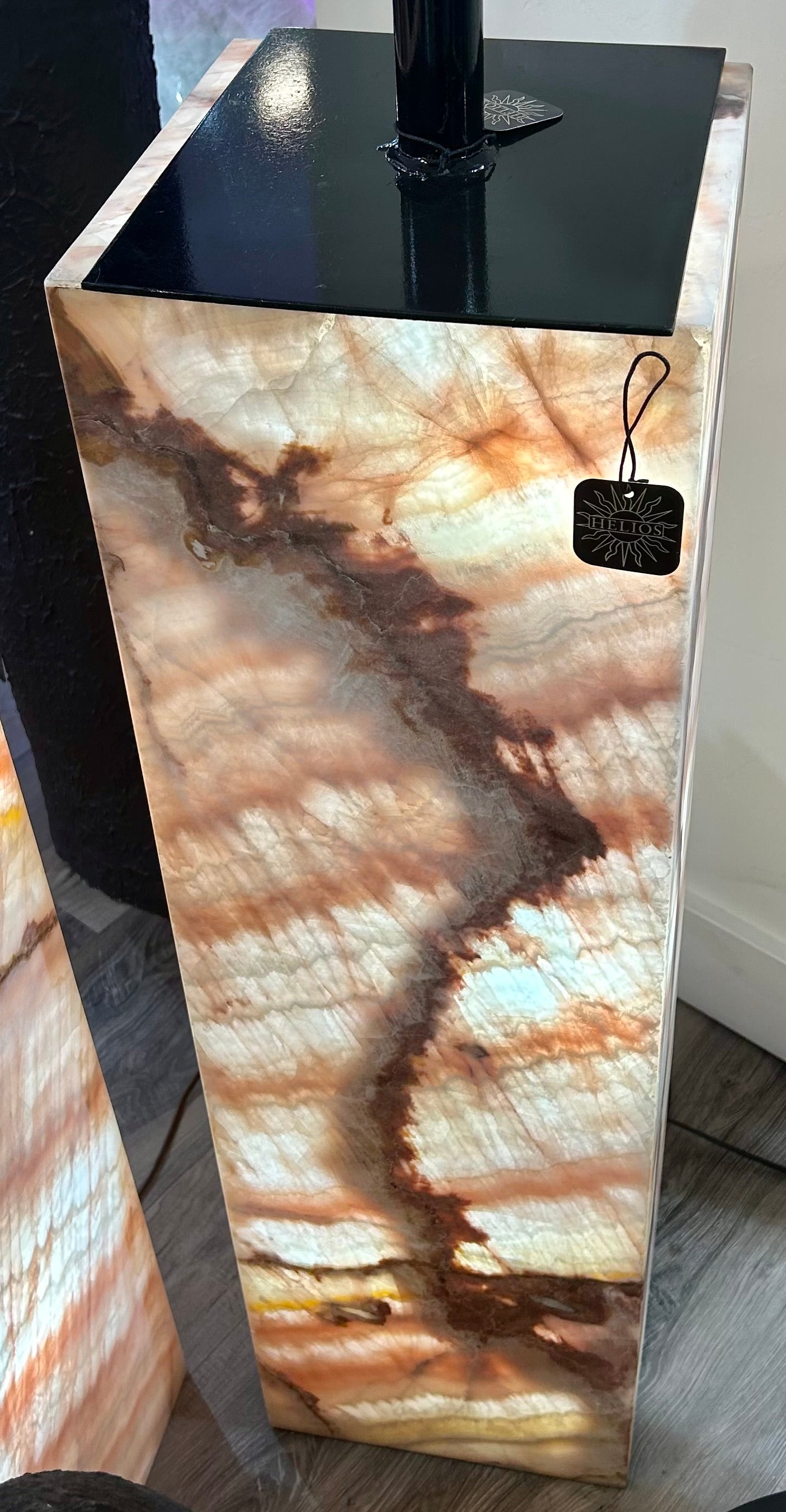 Introducing the luxurious Rose Onyx Column. Crafted from stunning rose onyx, this lamp column exudes elegance and sophistication. The beautiful pink hue adds a touch of opulence to any room. Elevate your decor with this exquisite piece that will surely make a statement.Measures approx. 12"W x 41"H. Rose Onyx Column