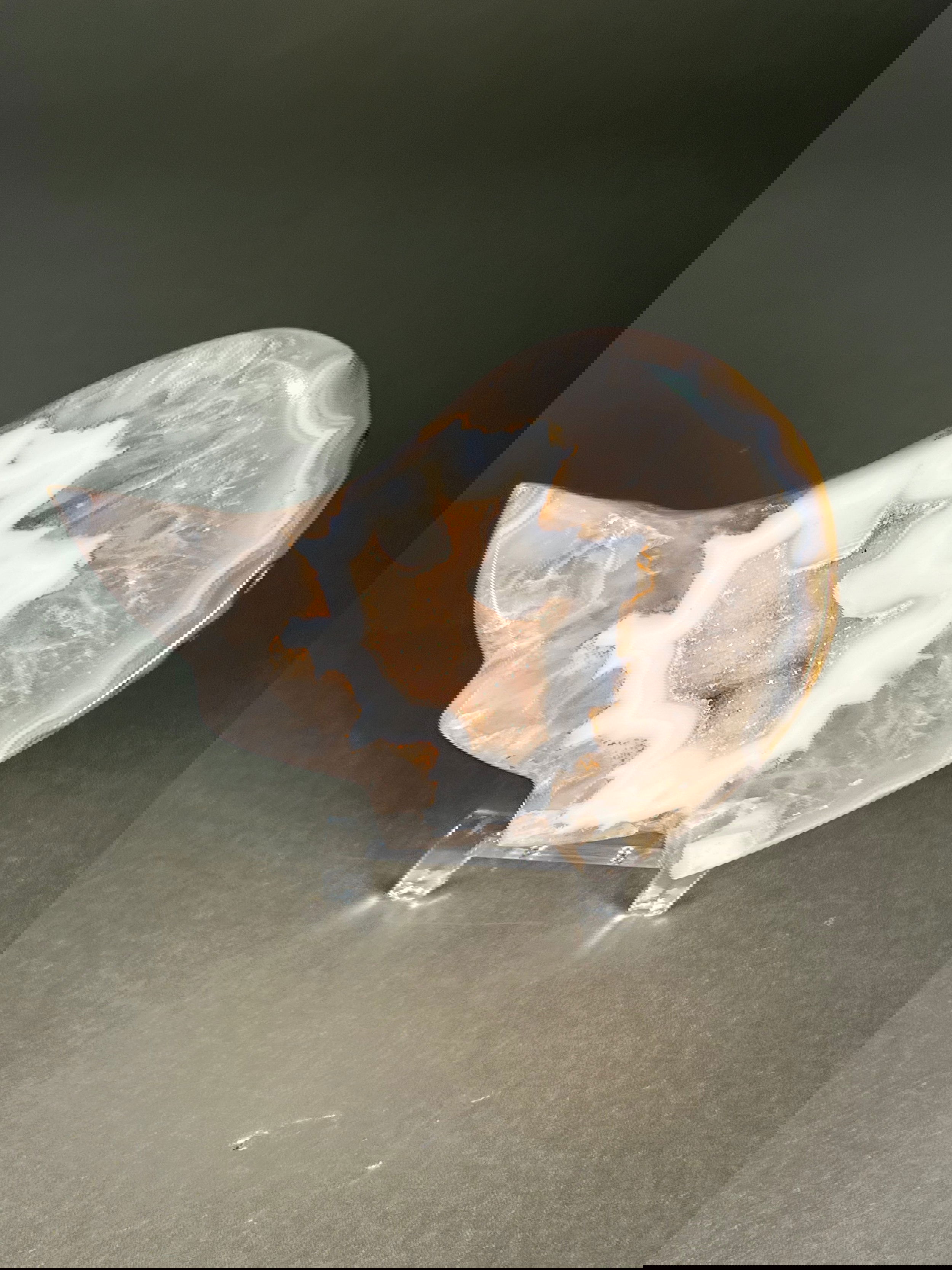 Embrace the beauty of our Agate Wing. Each piece is crafted from agate, displaying an array of colors in a delicate wing shape. Perfect for adding a touch of sophistication to your home decor or as a unique statement piece in your collection.Approx. 1.5" x 4" Agate Wing