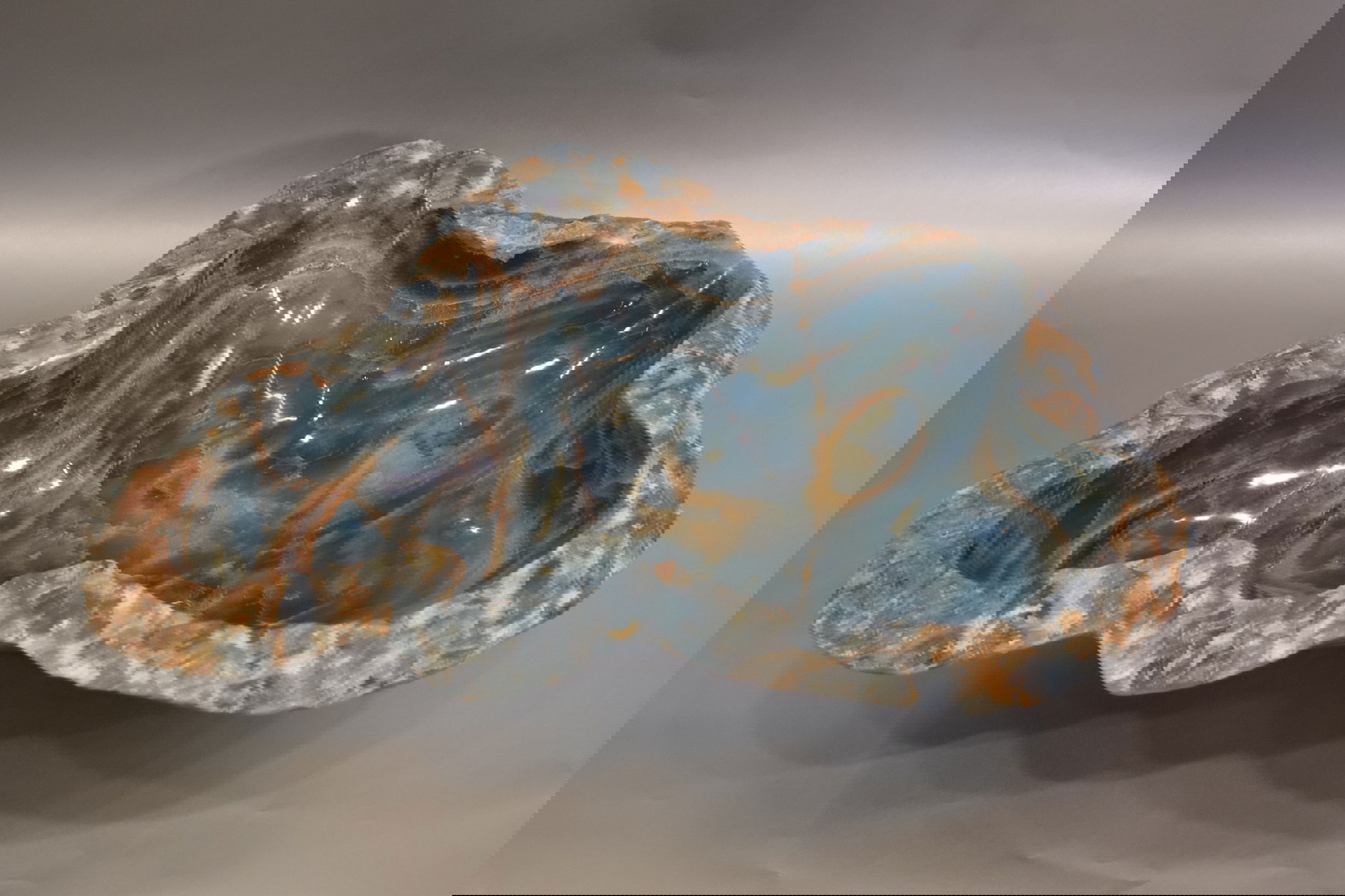 Indulge in luxury with our Blue Onyx Freeform Bowl. Crafted from rich, blue onyx, this freeform bowl features intricate veins for a unique and sophisticated touch. Elevate your decor and add a touch of exclusivity with this stunning piece.Approx. 20" x 5.25" Blue Onyx Freeform Bowl