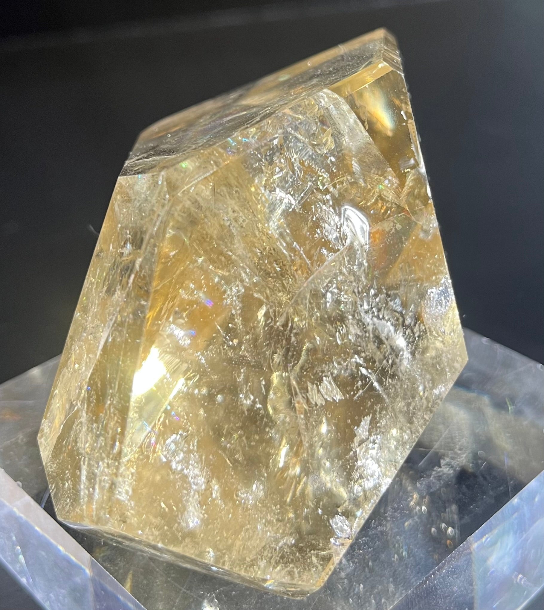 This polished citrine features a captivating smoky tone.Approx. 3"H x 3 1/2"W Polished Free Form Citrine Mineral Specimen