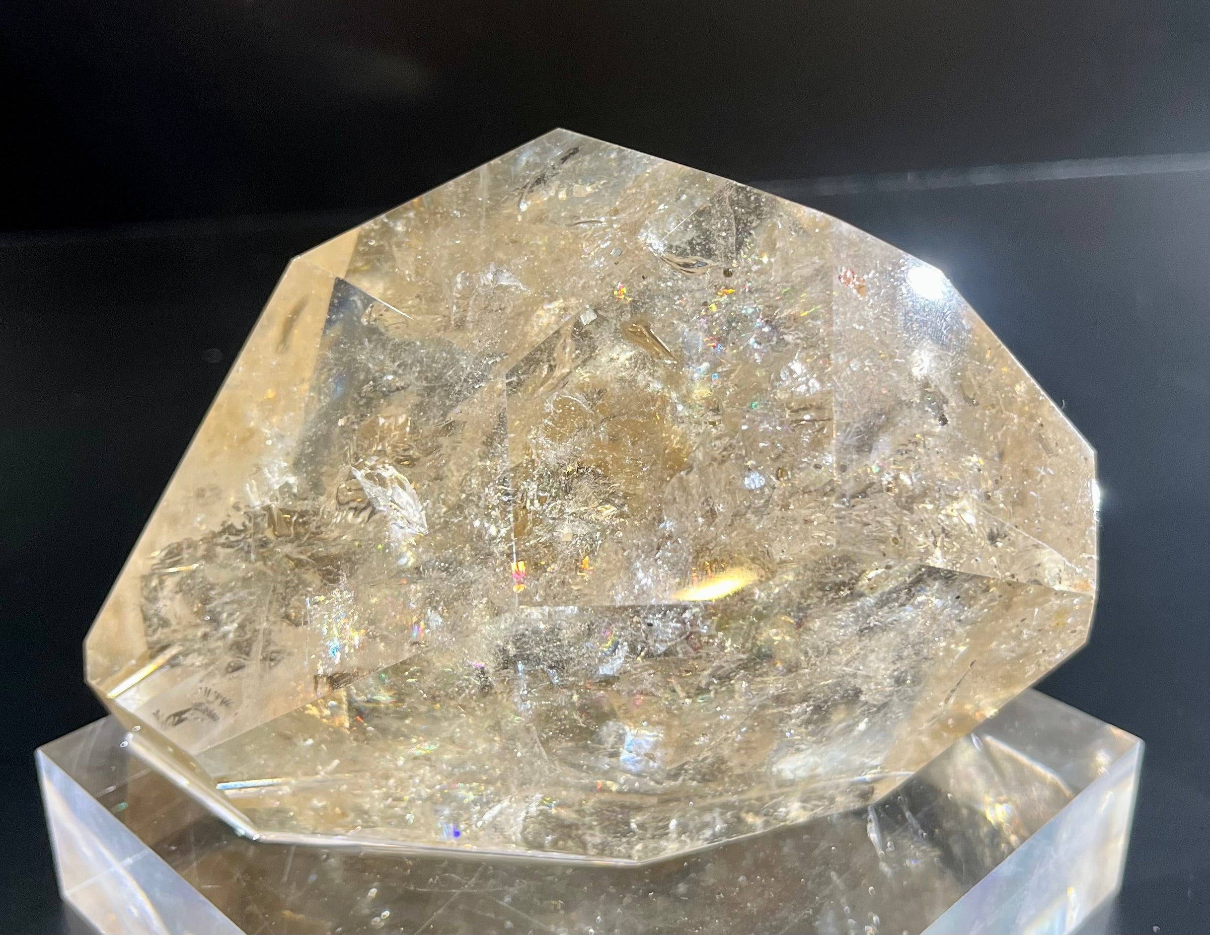 This polished citrine features a captivating smoky tone.3 1/4"H x 4 1/4"W Polished Free Form Citrine Mineral Specimen
