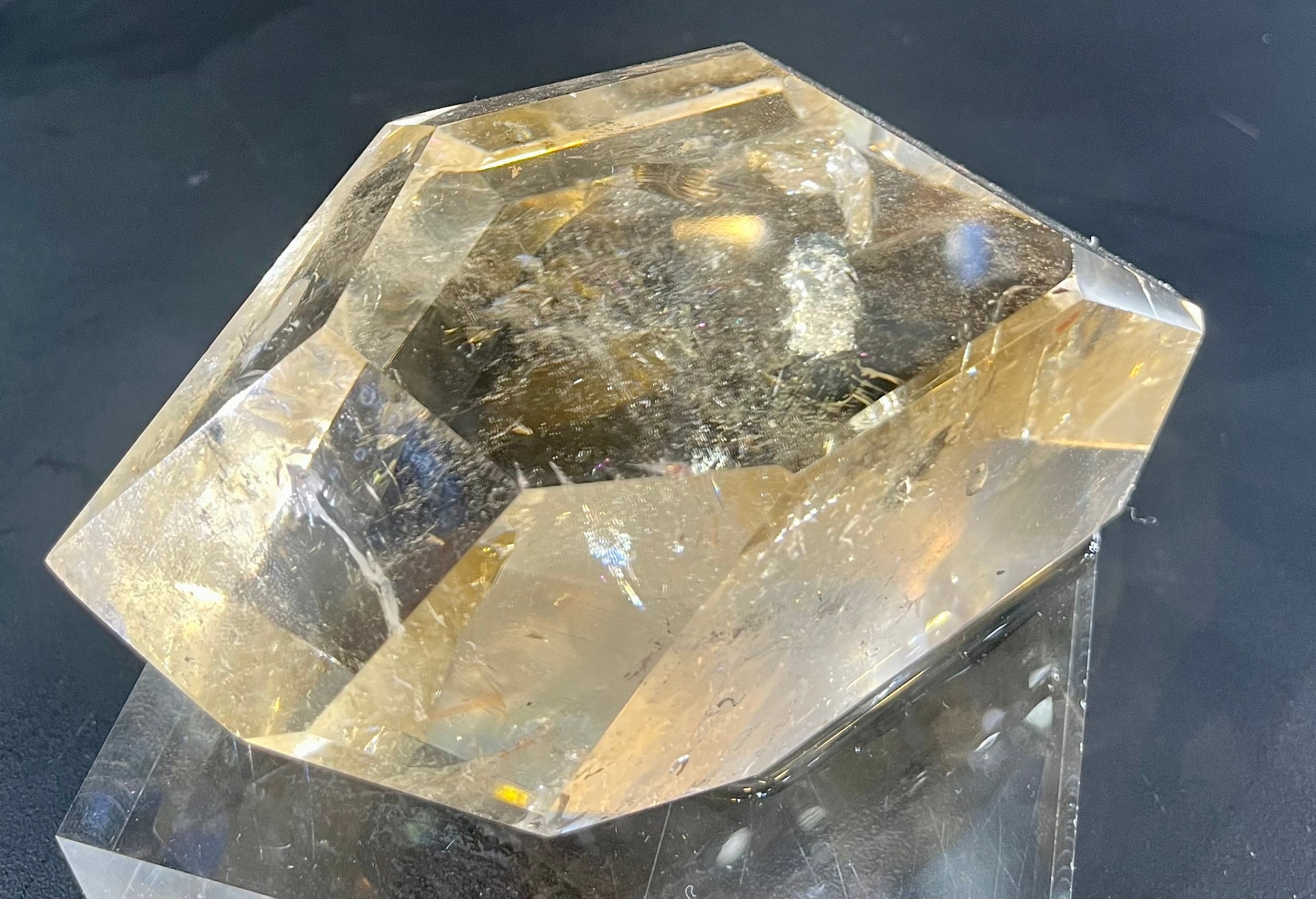 This polished citrine features a captivating smoky tone.Approx. 2"H x 4 1/2"W Polished Free Form Citrine Mineral Specimen