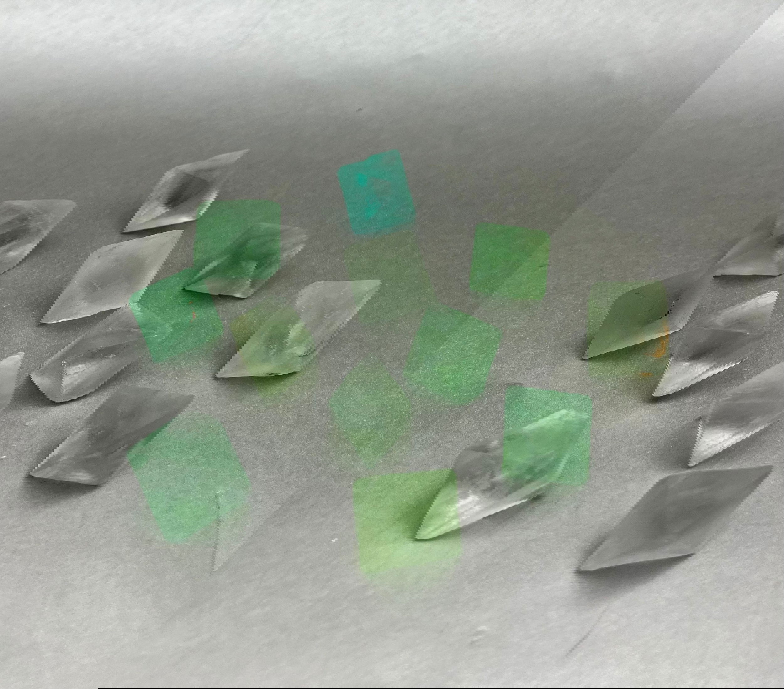These small Fluorite Diamond specimens with their Octahedron shape captivate with their green color tone. Individually packed in gift-boxes (see photo). Order also includes information sheet. The perfect gift to a curious friend or yourself. Color, Shape, & Size will vary to each piece. (All very similar). Fluorite Diamonds