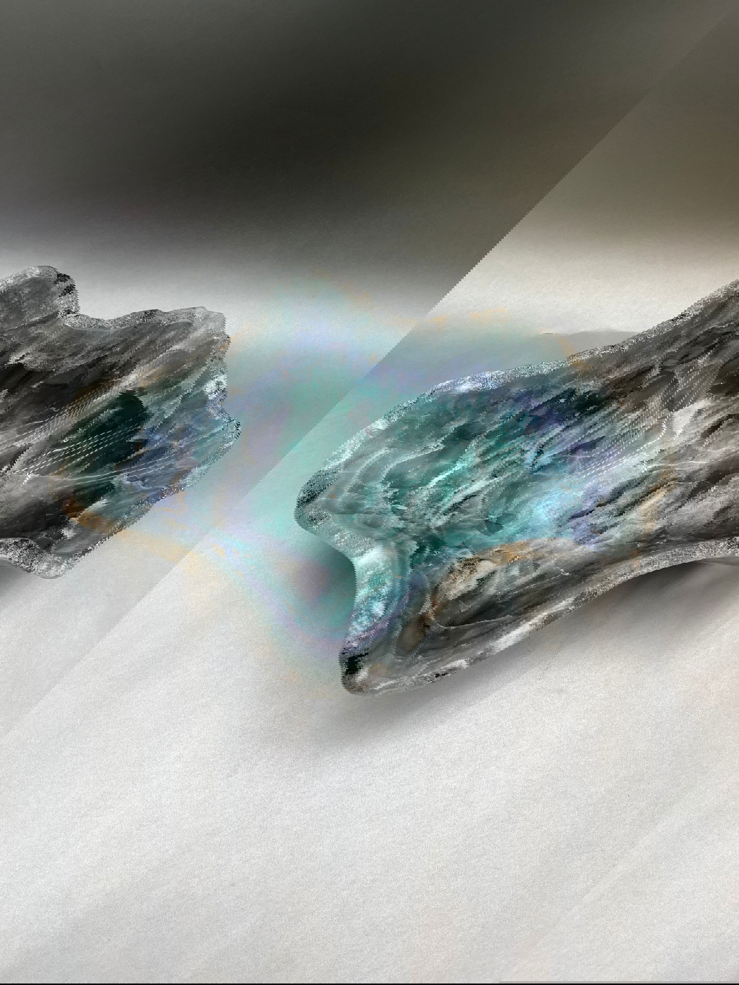 This opulent Flourite Bowl features a captivating synthesis of rich greens and tranquil blues, with dimensions of 9.5"x13" - a sophisticated selection for the home. Flourite Bowl