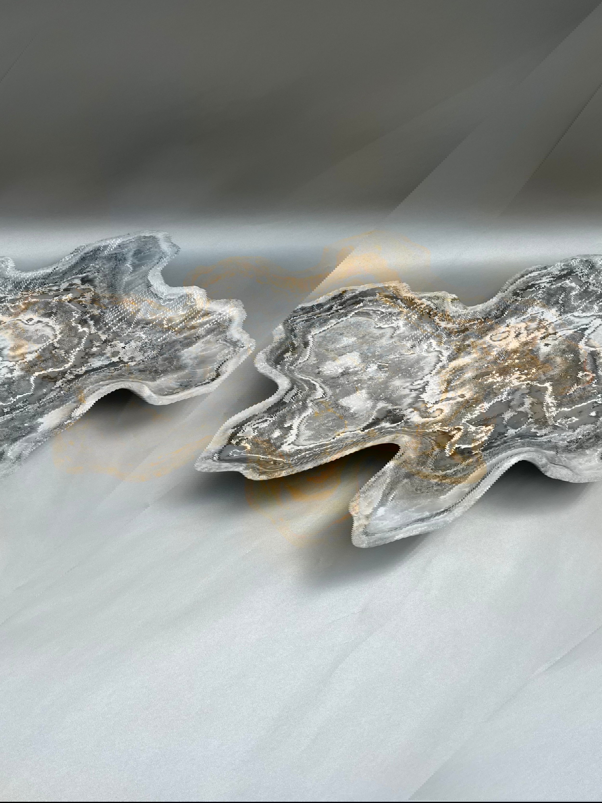 This Onyx Bowl boasts a low-profile design measuring 20"x27". Free Form Low-Profile Onyx Platter