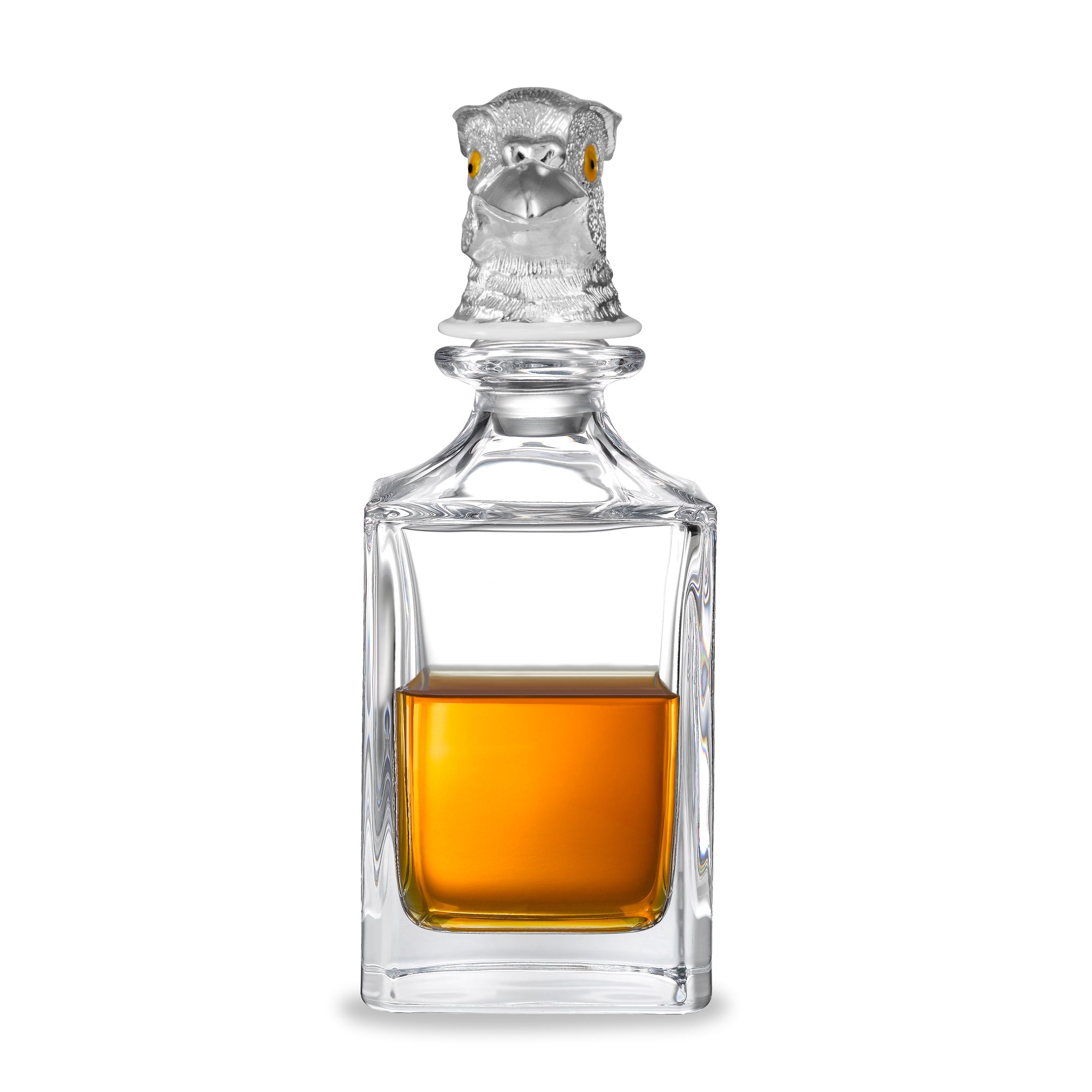 Our beautiful crystal glass decanters are extra special. Manufactured in a traditional square spirit style by Dartington. Once the decanters are delivered to Deakin & Francis, we pair with one of our stunning stoppers which are designed in our factory, in Birmingham’s historic Jewellery Quarter. The decanters hold 65cl.This decanter is finished with a stunning, metal plated pheasant head stopper with stunning bright yellow eyes, designed and manufactured by Deakin & Francis. The perfect way to add a touch of the country to your home! Silver Pheasant Head Crystal Decanter