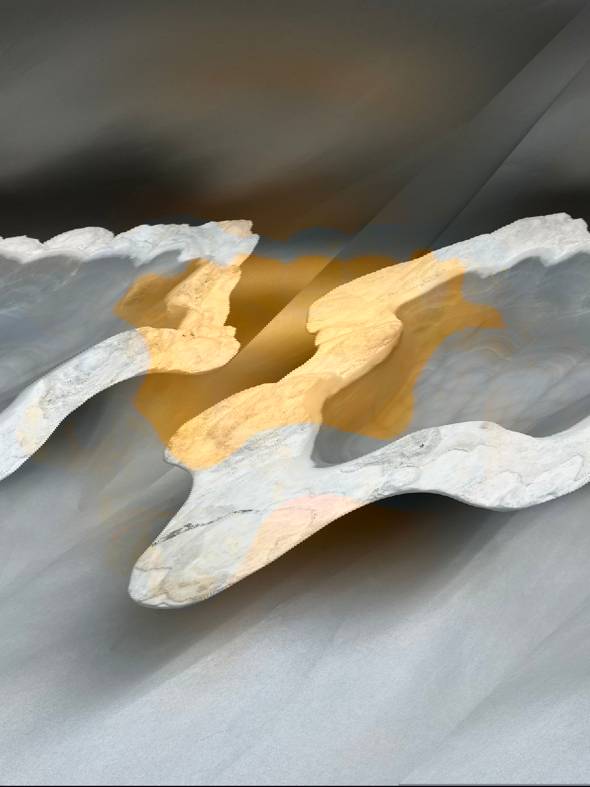 This beautiful "Honey" Onyx Carved Bowl is perfect for accentuating your décor. Hand-carved from natural onyx, it features a glossy finish that catches the light beautifully. Add it to your home and enjoy its unique, detailed design.18"x22"x7" Honey Onyx Carved Bowl