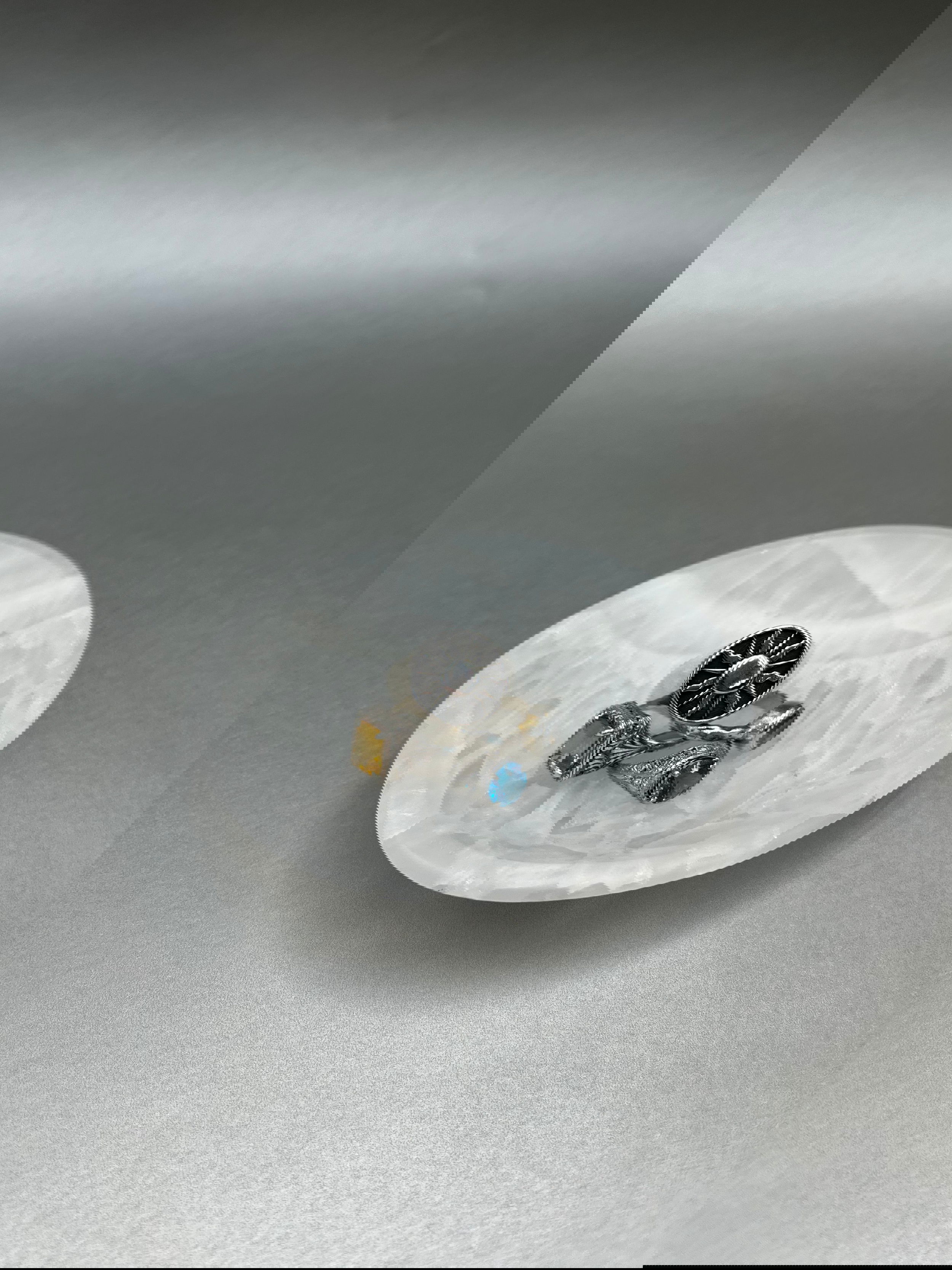 The Ice Onyx Low-Profile Ring Bowl measures 4"x1", ideal for small pieces. Ice Onyx Low-Profile Ring Bowl