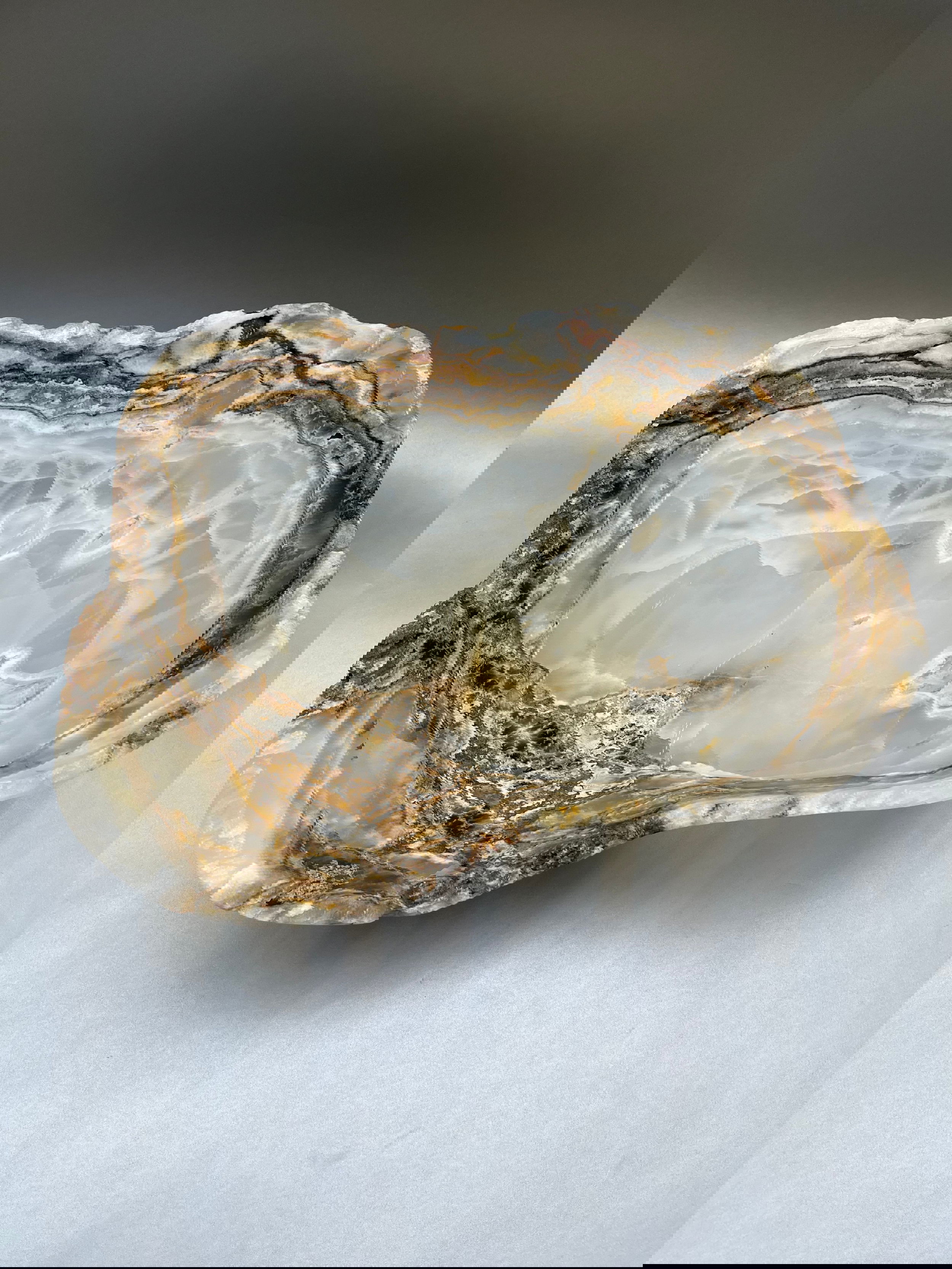 Graceful, matte Onyx bowls in a generous 17"x12"x6" size, epitomizing luxuriousness and timelessness. Onyx Matte Bowl
