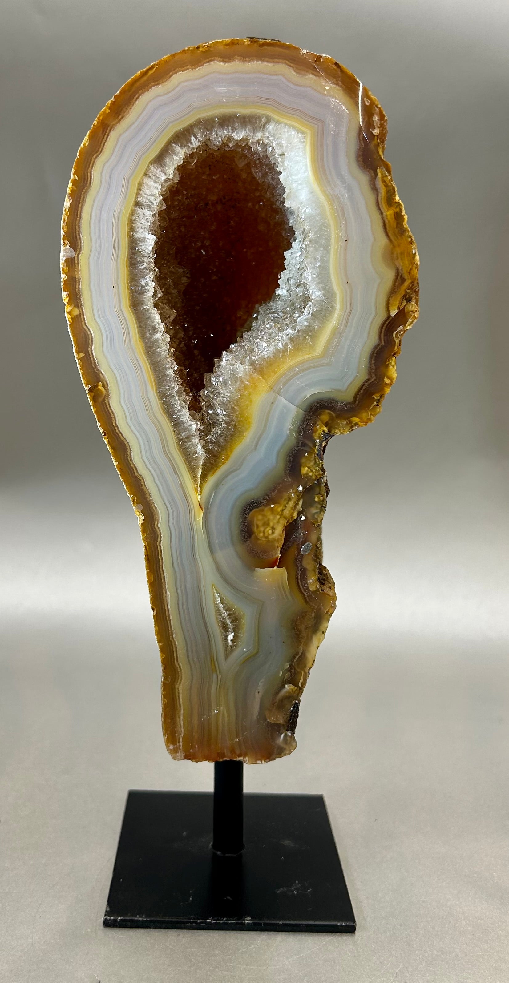 Alluring Druzy Agate Geode set on metal stand. Approx. 3.75" x 7.5" with out standApprox. 3.75" x 9.5" with stand Druzy Agate on Metal Stand