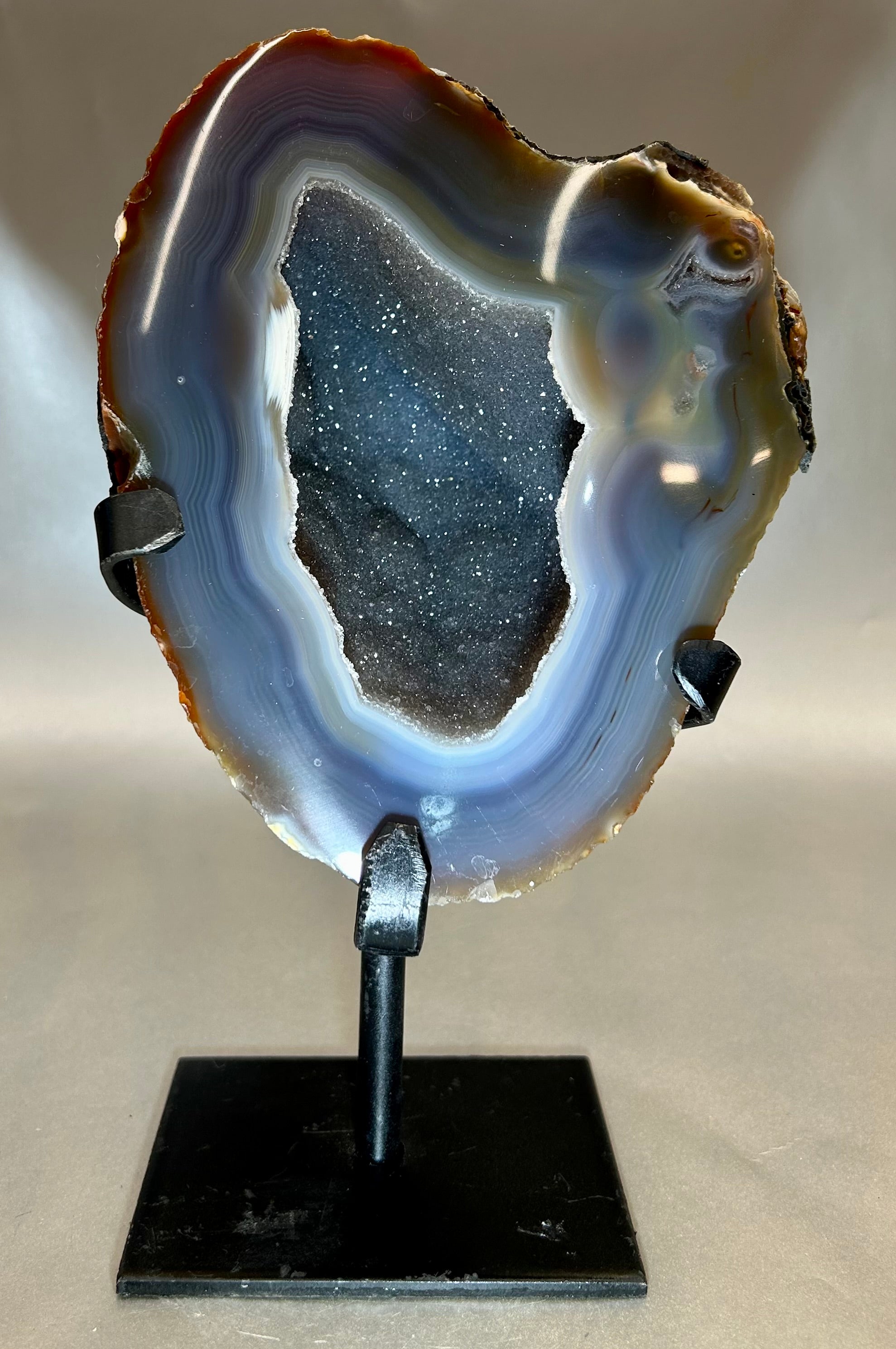 Alluring Druzy Agate Geode set on metal stand. Approx. 5.5" x 6.5" with out standApprox. 5.5" x 9.5" with stand Druzy Agate on Metal Stand