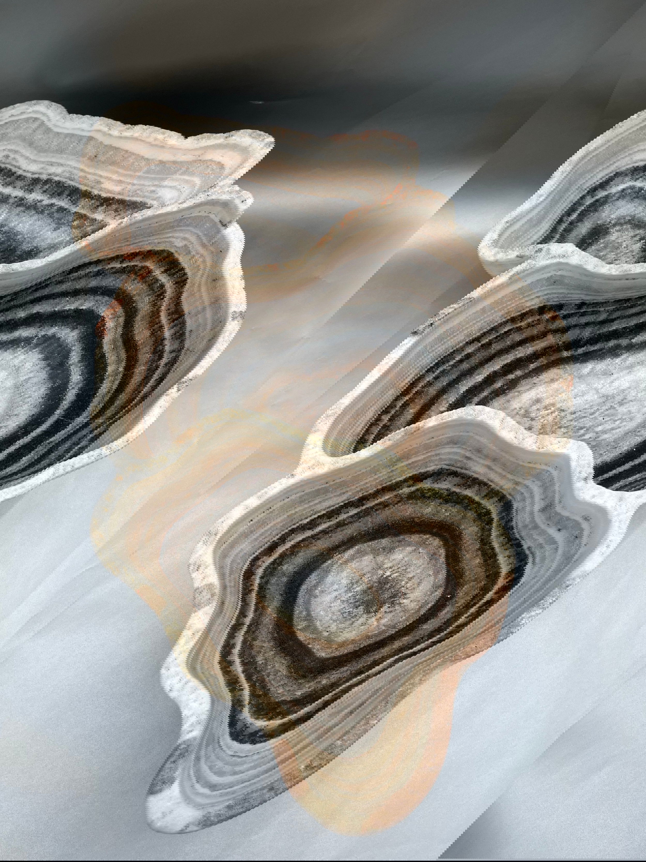 This exquisite three-chambered Onyx Bowl measures 17"x29 1/2"x8", providing bountiful decorative potential. Its versatile nature makes it ideal for any environment, from classic to contemporary. Multi Chamber Onyx Bowl